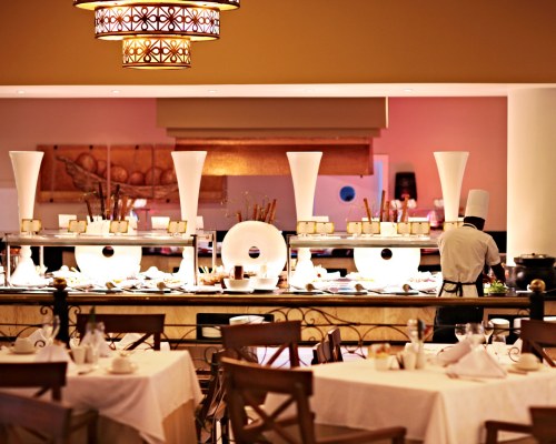A WELL FURNISHED AN INDOOR FINE DINING RESTAURANT WITH BUFFET.