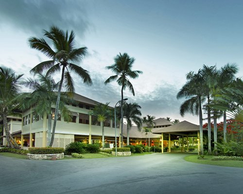 Grand Palladium Palace Resort Spa & Casino, building with palm trees
