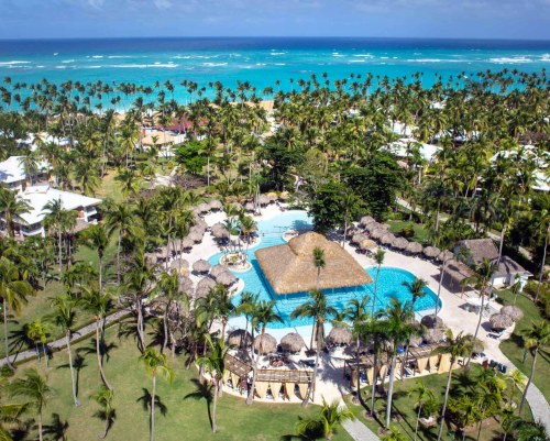 aerial view beachfront resort with lush greenery, Grand Palladium Palace Resort Spa & Casino