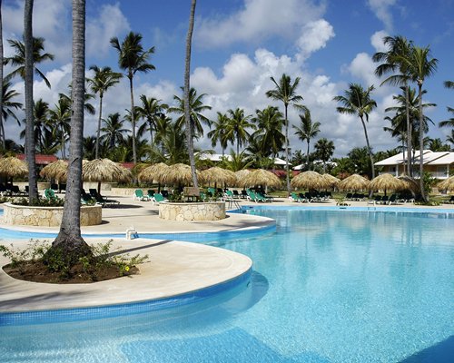 large swimming pool and cabanas at Grand Palladium Punta Cana Resort & Spa