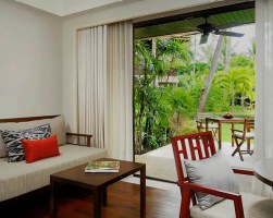 Modern tropical living room with garden view