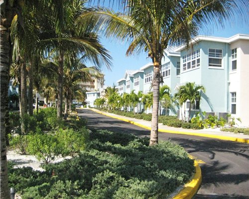 Scenic exterior view of Barefoot Beach Resort with a pathway.