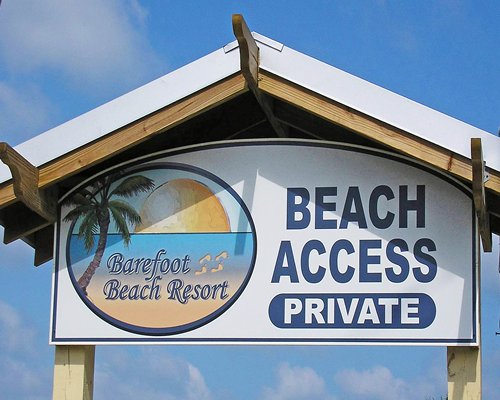 Signboard of Barefoot Beach Resort.
