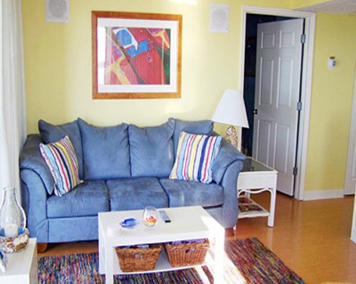 A well furnished living room with a sofa.
