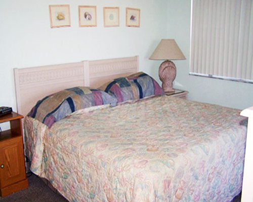 A well furnished bedroom with an outside view.