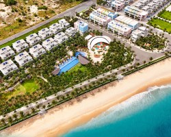 Aerial view of tropical beachfront resort complex