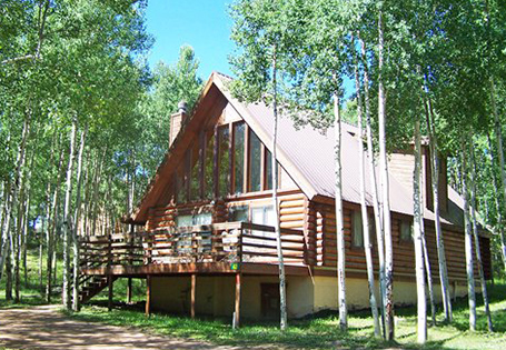 A sunlit cabin in the woods