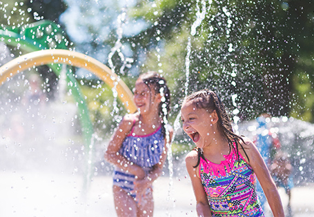 Kids playing at a water park