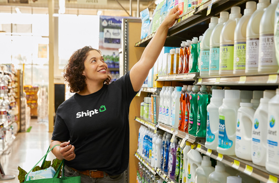 A woman personal shopping for Shipt