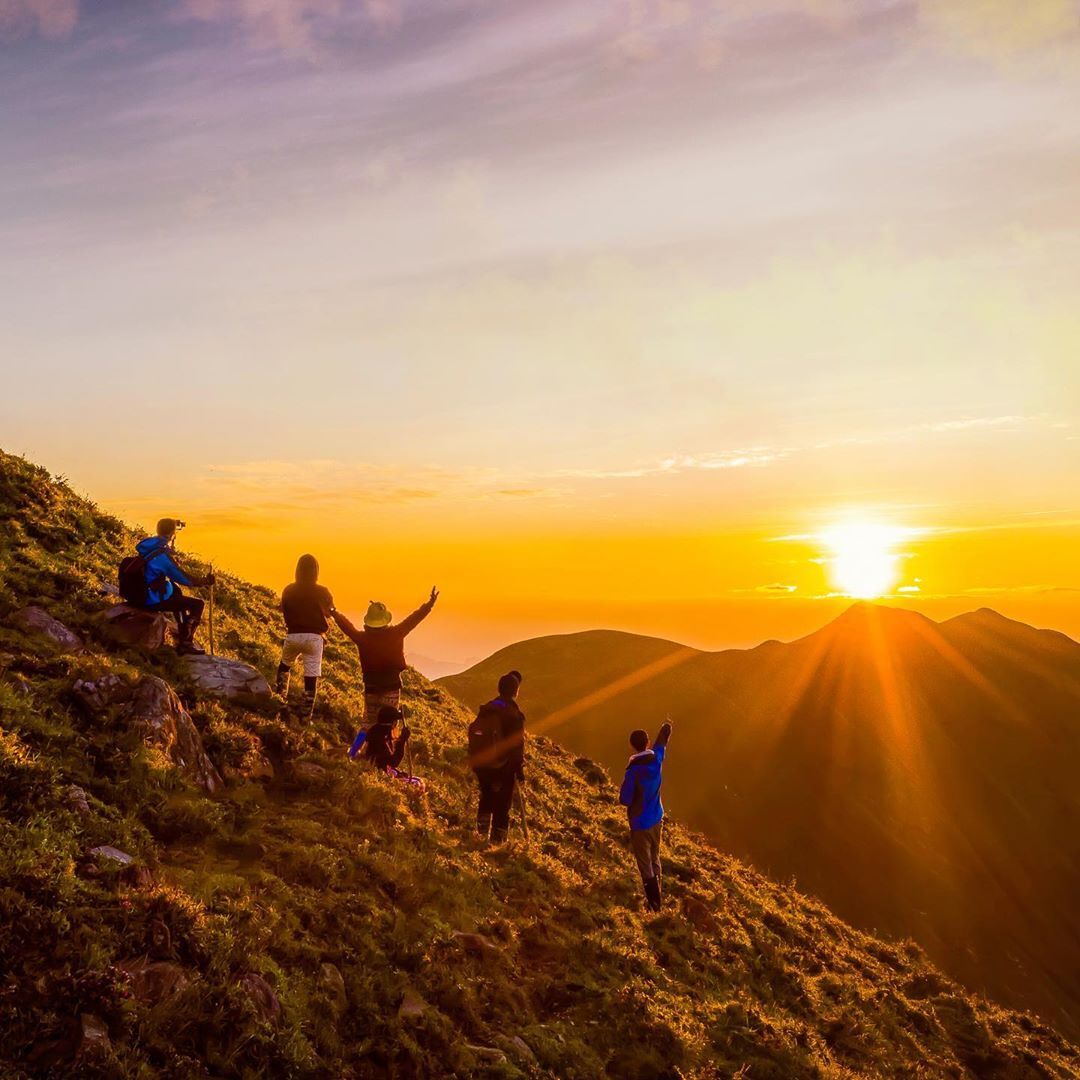 Catch the sunrise from the peak of Fansipan Mountain.