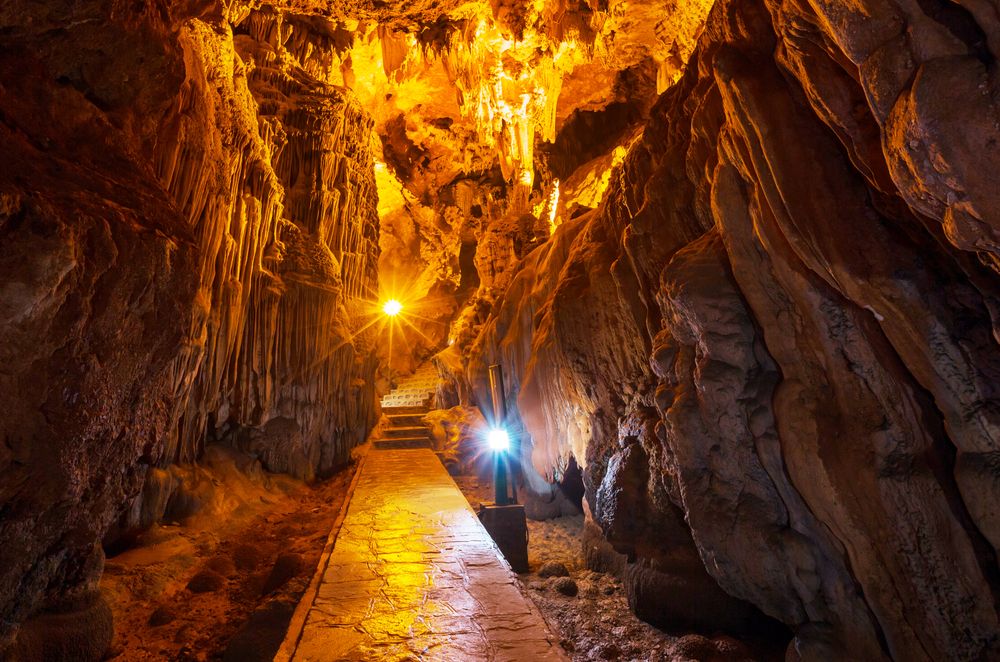 Stalactites and stalagmites fill the Nguom Ngao Cave.