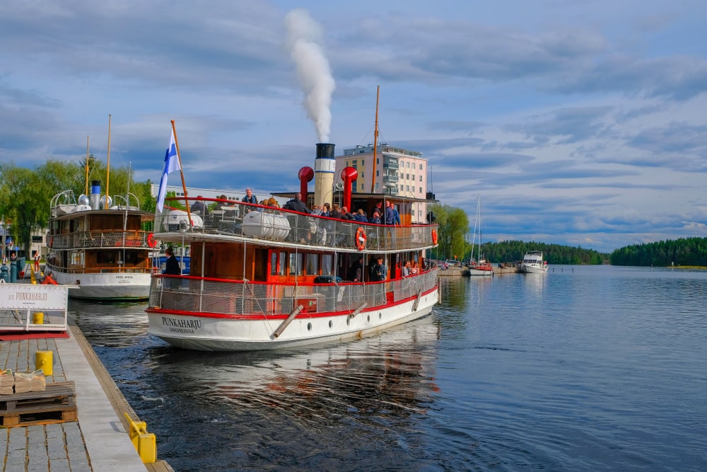 Travellers get on the classic steamboat at Lake Saimaa, which brings them to nearby islands for scenic visits.