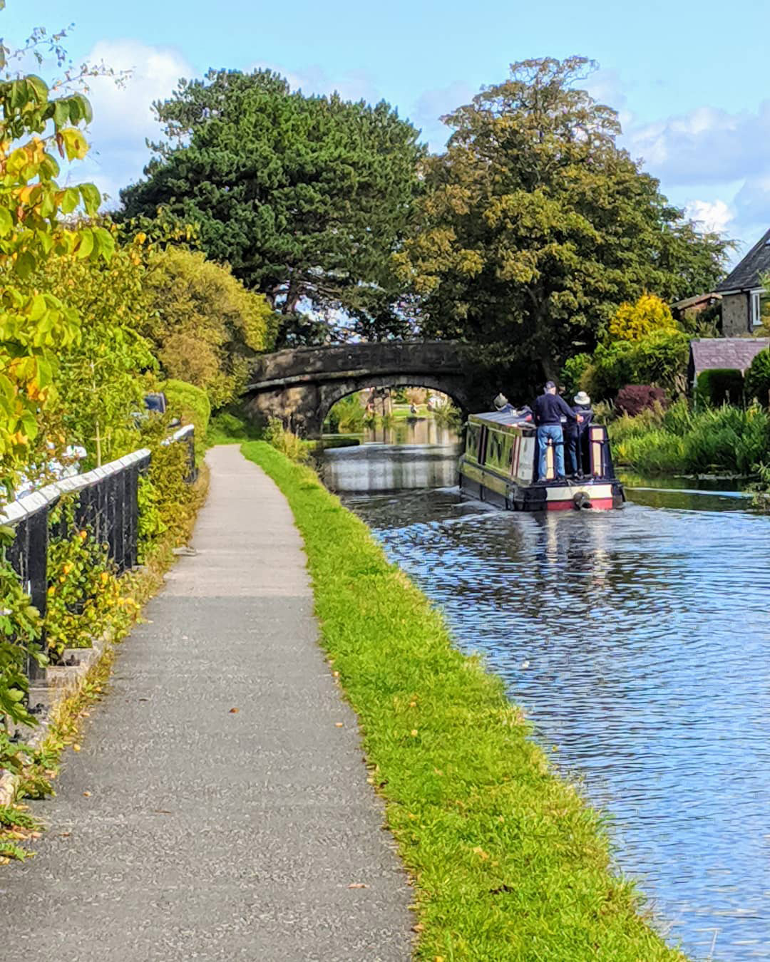 Cruise down the Lancaster canal in a narrowboat during summer for a relaxing and scenic holiday.