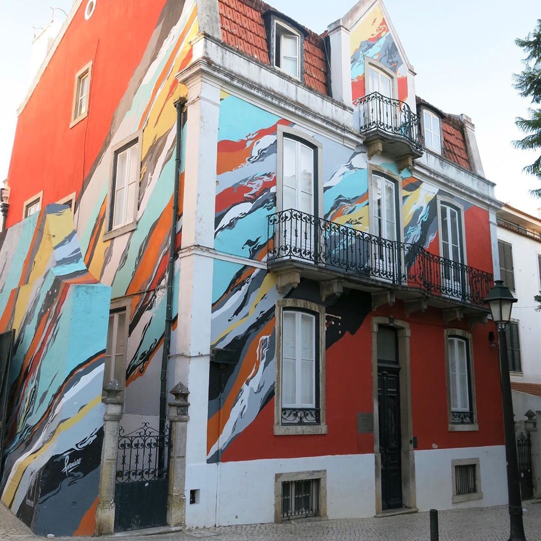 Admire the stunning street murals around the town of Cascais