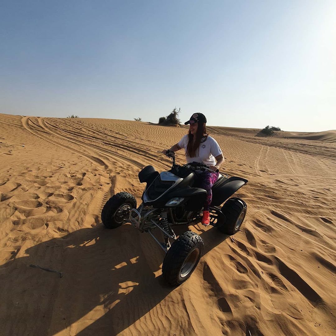 Enjoy an action-packed adventure and glide down steep sand dunes on a quad bike.