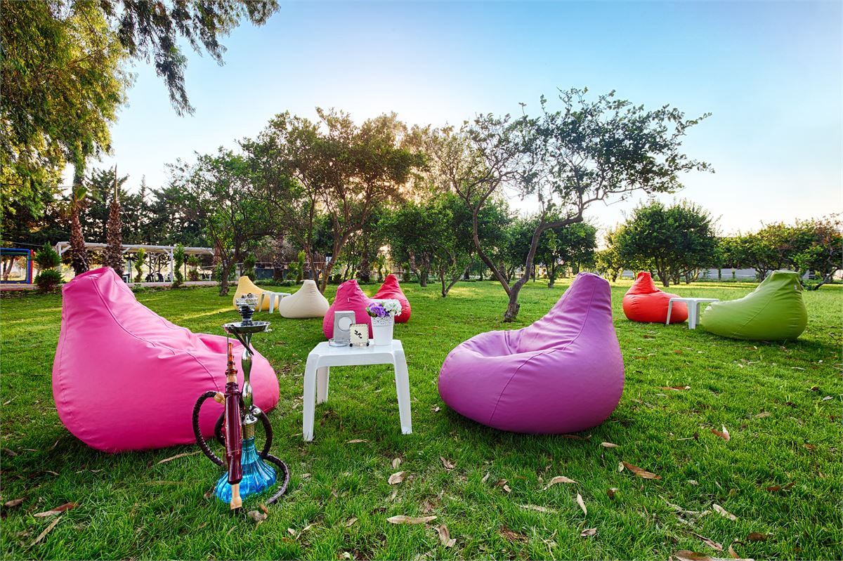 Chill out in the sun on the colourful beanbags, right on resort grounds.